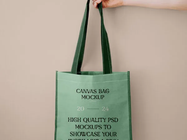 Front View of Canvas Shopping Bag Mockup in Hand 1