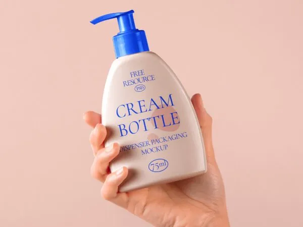 Front View of Hand Holding Cosmetic Bottle Mockup 1