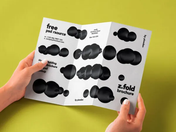 Front View of Hand holding 3Fold Brochure Mockup 1