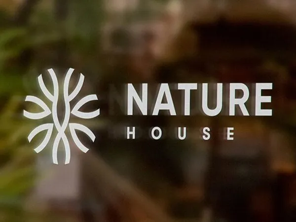 Front View of Logo Sign Mockup on a Shop Window 1