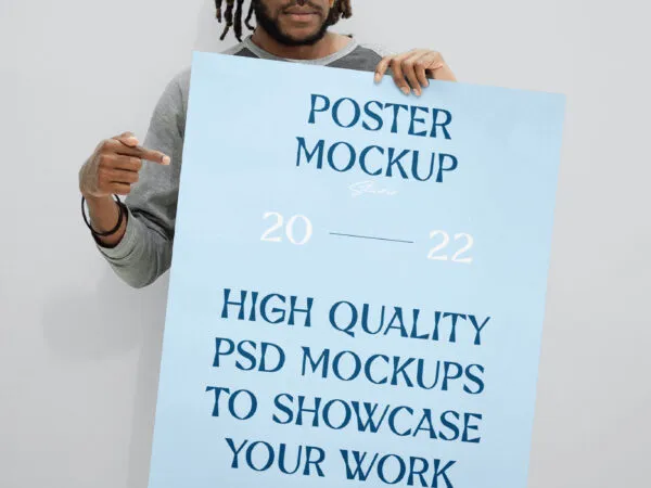 Front View of Man Holding Huge Poster Mockup 1