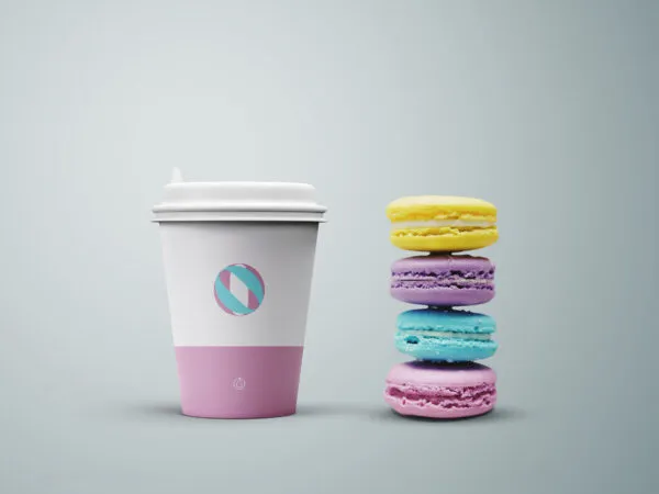 Front View of a Coffee Cup and Colorful Cookies 1