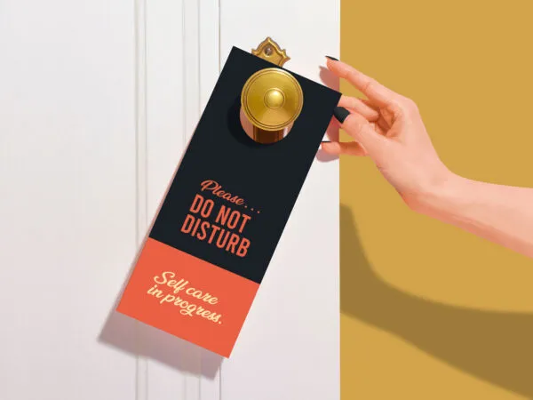 Front View of a Door Hanger on Doorknob Mockup 1