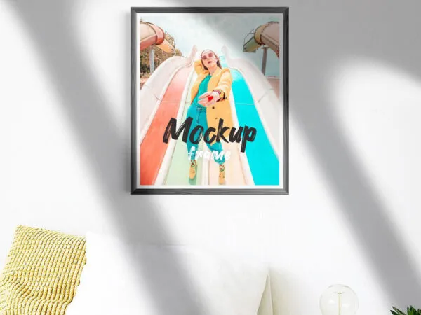 Front View of a Framed Poster in Room Mockup 1