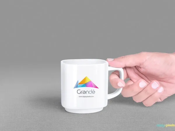 Guys Hand Holding a Mug Mockup 1