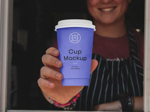 Hand Holding Coffee Cup Mockup 1