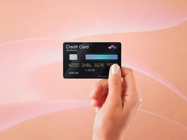 Hand Holding Credit Card Mockup in Front View 1
