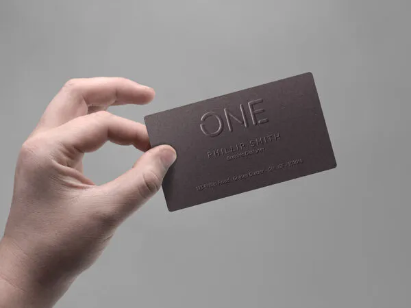 Hand Holding Realistic Business Card Mockup 1