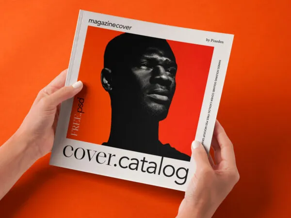 Hands Holding Square Catalog Mockup in Perspective View 1