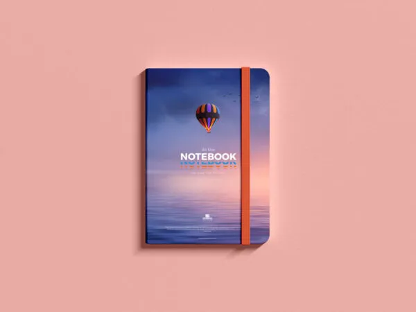Hardcover Notepad with Elastic Band in Top View Mockup 1