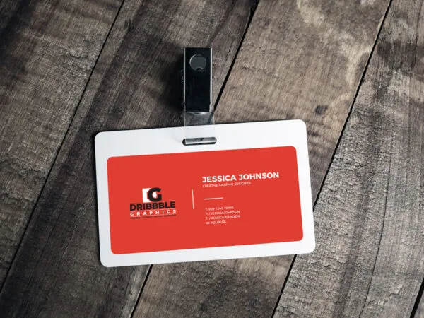 Horizontal Plastic ID Card Badge with the Badge Clip in the Overhead View Mockup 1