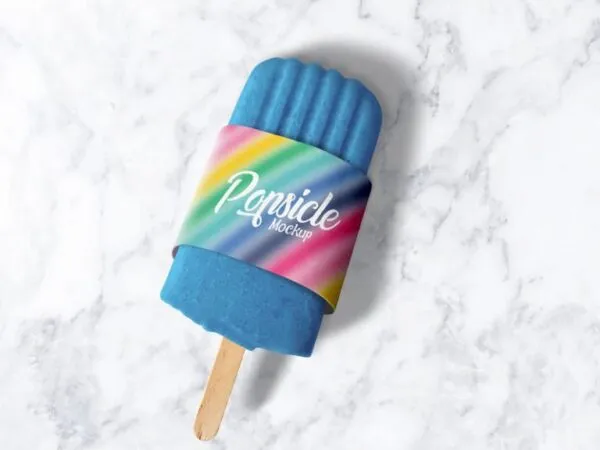 Ice Popsicle in Packaging Sleeve Laid in the Top View Mockup 1