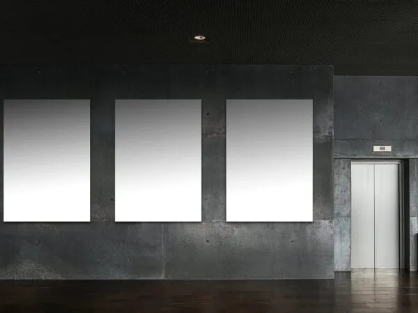 Indoor Scene Mockup Showing Three Billboards Attached to a Wall 1