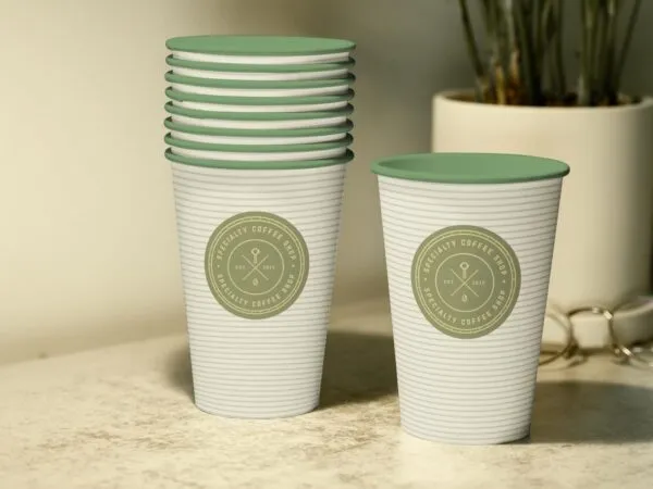 Interior Coffee Cup Logo Mockup on a Surface 1