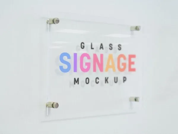 Left View of Logo on a Glass Sign on a Wall Mockup 1