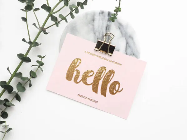 Life Like Greeting Card Mockup Next to a Flower 1