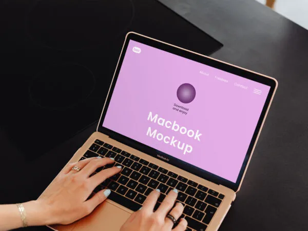 MacBook Air Mockup with Hands in Perspective View 1