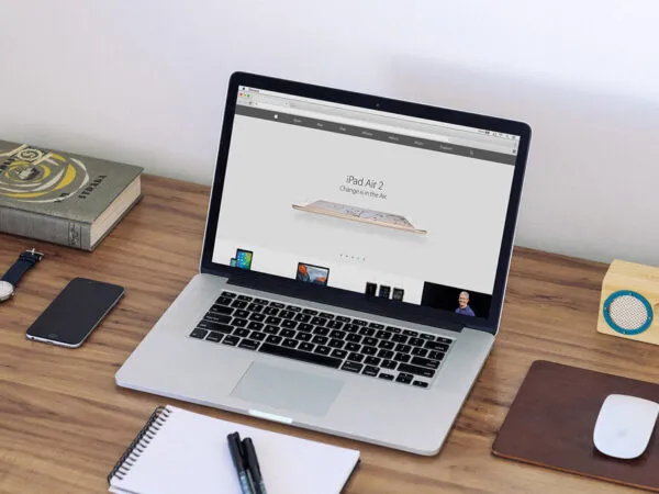 MacBook Mockup in a Super Realistic Workspace 1