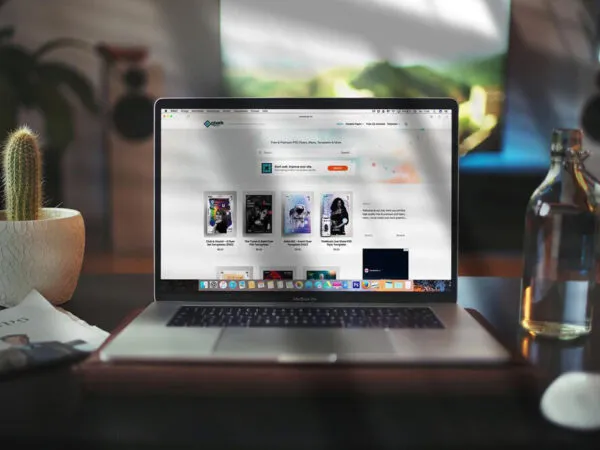 MacBook Pro Opened on Table in Front View Mockup 1