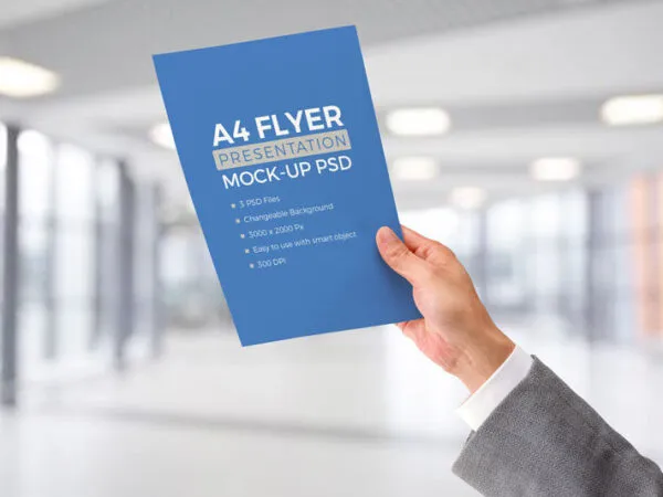 Male Hand Holding A4 Letterhead Paper Mockup 1