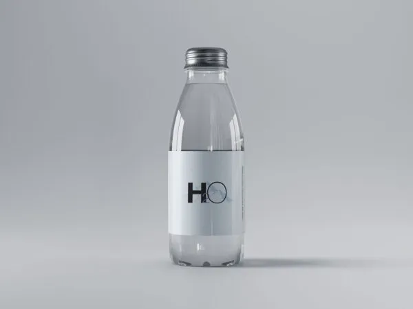 Mini Glass Water Bottle Placed on a Solid Floor 1