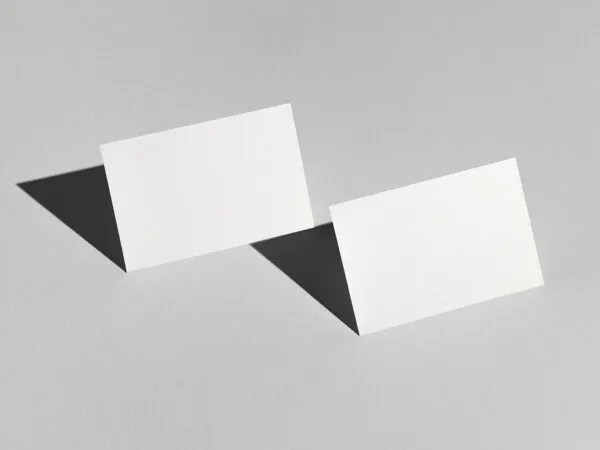 Minimalistic Mockup of Two Stand up Business Cards with Strong Shadows 1
