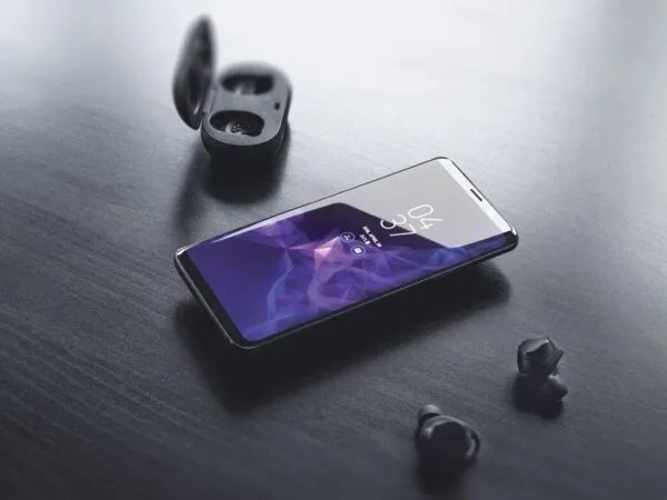 Mockup Displaying Galaxy S9 Plus with Airpod and its Opened Case 1