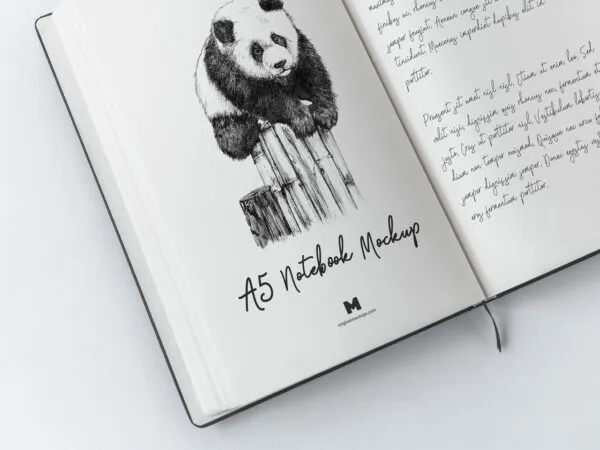 Mockup Displaying Opened A5 Hardcover Notebook with Sheet Separator 1