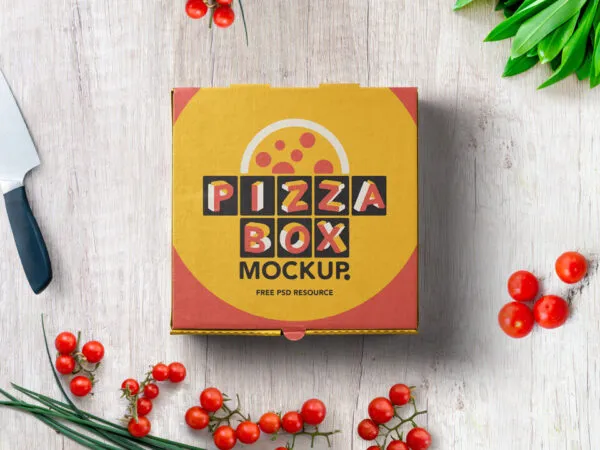 Mockup Displaying Top View of a Pizza Box on Wooden Surface Beside Cherry Tomatoes 1