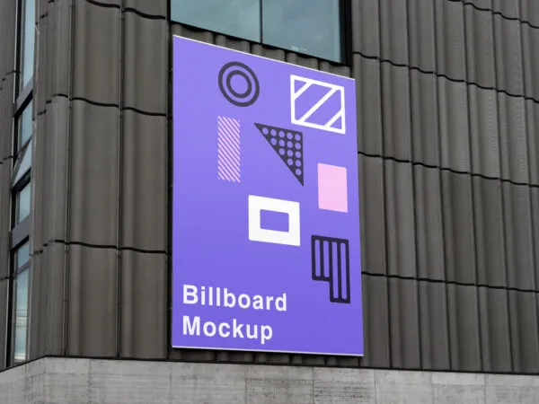 Mockup Displaying Vertical Billboard Mounted on a Building 1