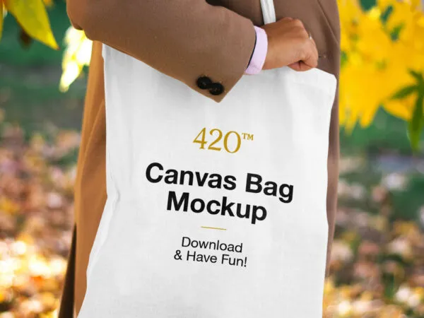 Mockup Features a Woman Holding the Canvas Bag 1