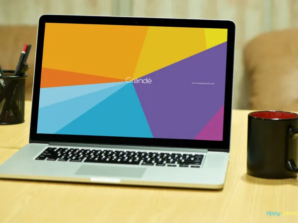 Mockup Featuring MacBook Pro on Wooden Table 1