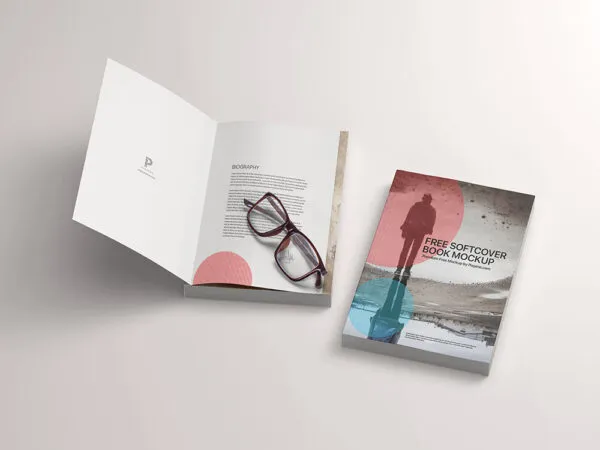 Mockup Featuring Two Open and Closed Softcover Books with Glasses 1