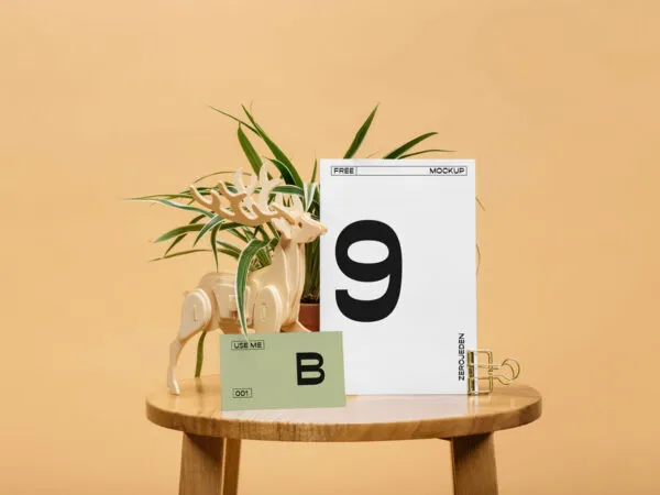Mockup Featuring Two Sized Cards on Wooden Round Table 1