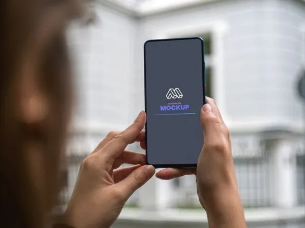 Mockup Featuring Woman Holding Smartphone 1