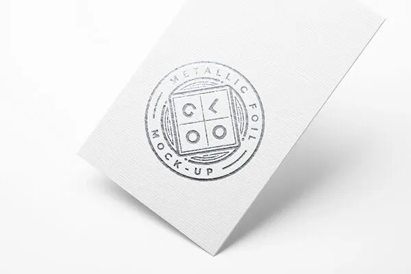 Mockup Featuring a Color Customizable Metallic Foil Logo on a Sheet of Paper 1