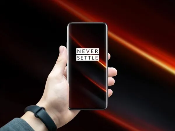 Mockup Featuring a Hand Holding a OnePlus 7T Pro 1