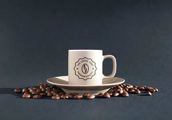 Mockup Showcasing Coffee Branding and Label on Cup and Sack 1