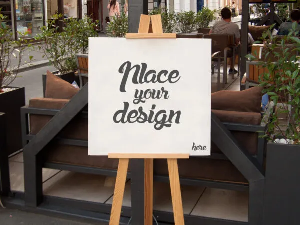 Mockup Showcasing Easel Holding a Square Canvas on Outdoor Environment 1