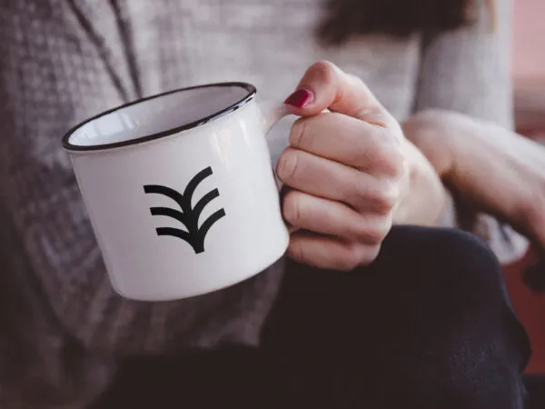 Mockup Showcasing Girl Holding Metal Mug 1