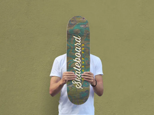 Mockup Showcasing Man Holding Skateboard in Front of His Face 1
