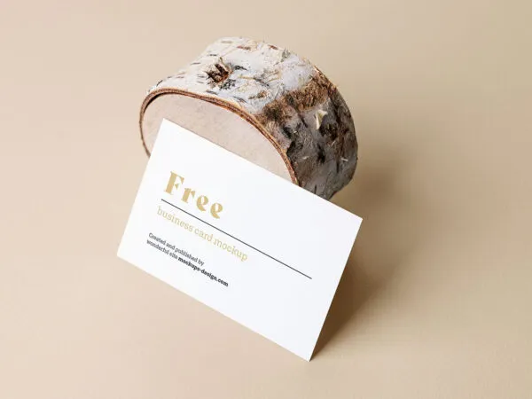 Mockup Showcasing Side View of Business Card Against Wood Trunk 1