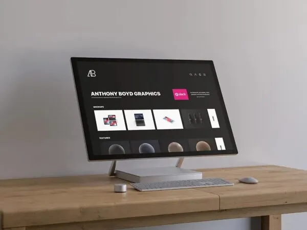 Mockup Showcasing Surface Studio on a Wooden Table 1