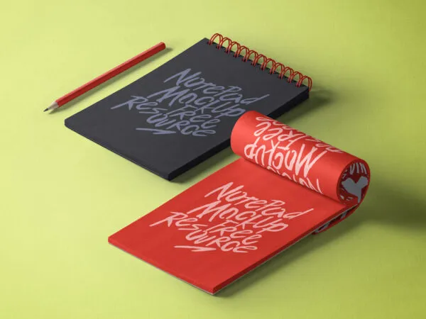 Mockup Showcasing Wired and Partly Rolled Notepad and a Floating Pen 1