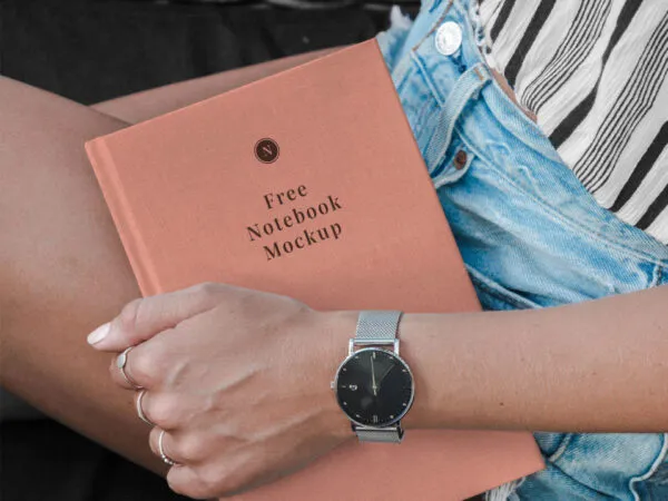 Mockup Showcasing a Girl Holding Hardcover Notebook 1