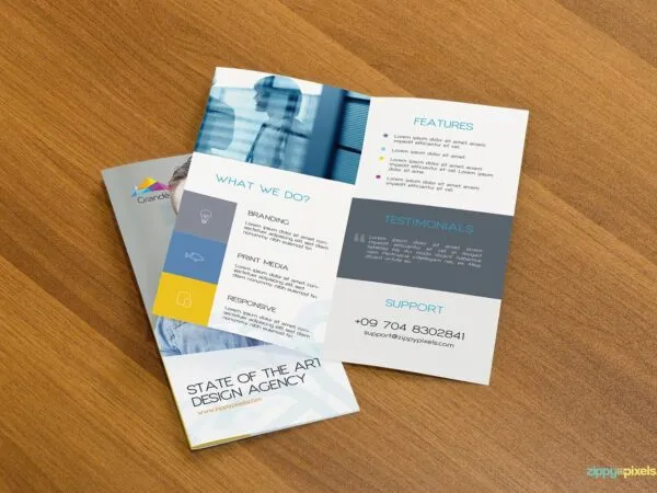 Mockup Showcasing an Opened Bifold Brochure on a Closed One 1