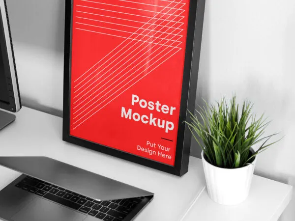Mockup Showing Frame Poster on a Table with Laptop and Vase 1