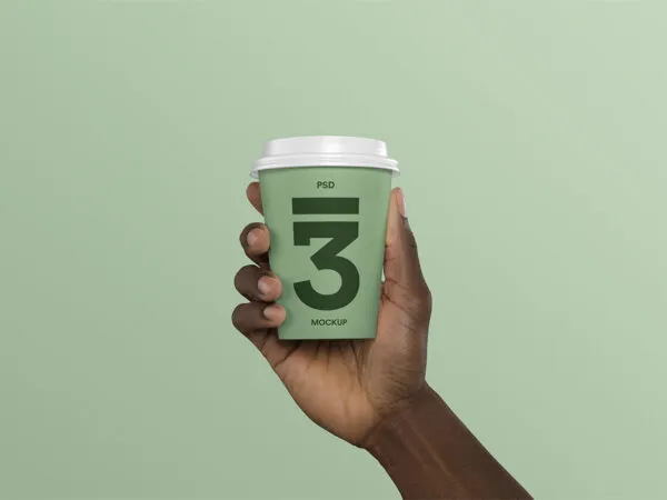 Mockup Showing Hand Holding Coffee Cup Wearing Lid 1