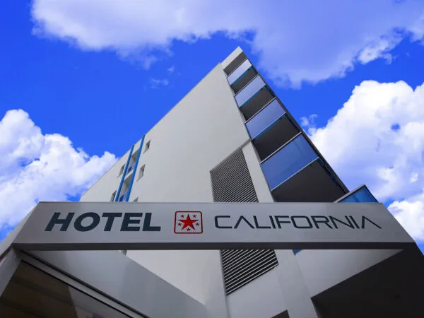 Mockup Showing Low Angle View of Hotel Fascia Board Logo 1