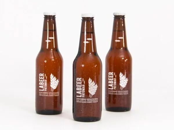 Mockup Showing Three Standing Beer Bottles with Metallic Caps 1